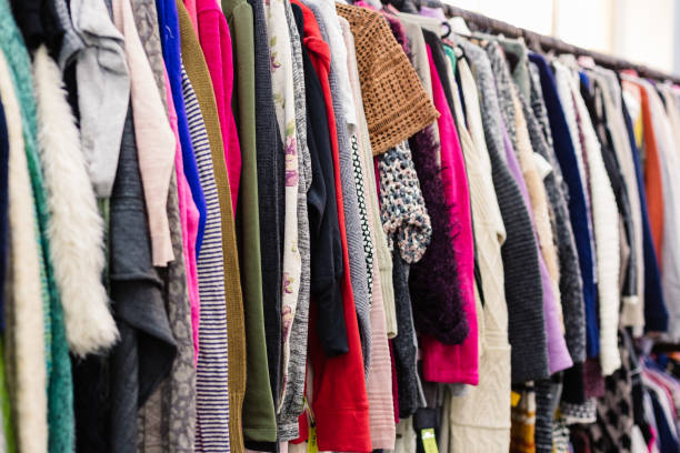 istock Clothes on hangers in shop. Close up 1134338789