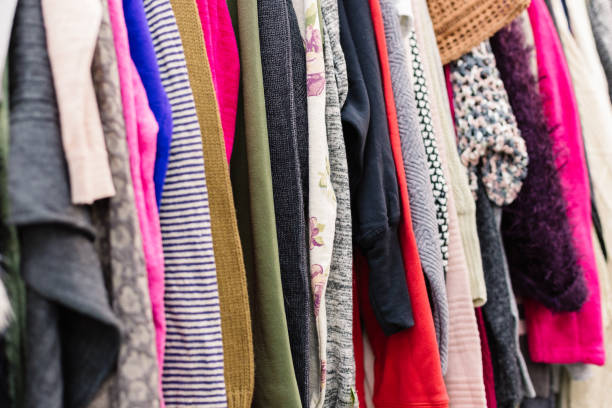 istock Clothes on hangers in shop. Close up 1134338830