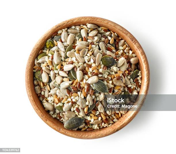 Mix Of Seeds In Wooden Bowl Stock Photo - Download Image Now - Seed, Variation, Nut - Food