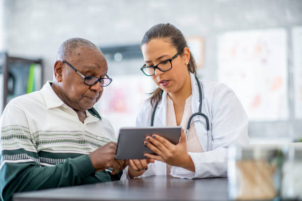 istock Man consults with his doctor 1134340767