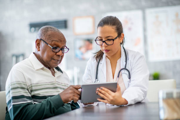 istock Man consults with his doctor 1134340775