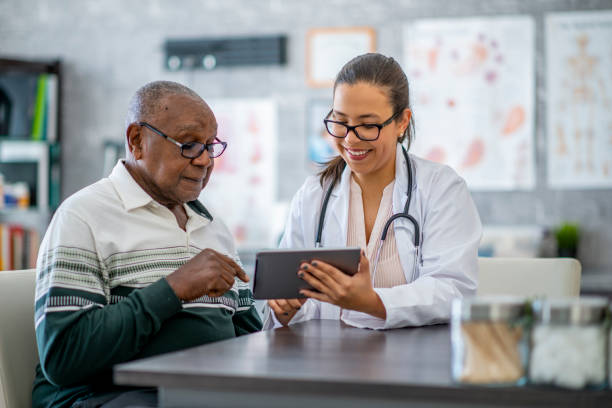 istock Man consults with his doctor 1134340781