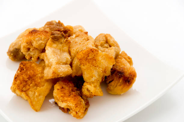 istock Pork snack, Pork rind, Pork scratching or pork crackling 1134344436