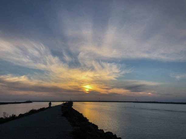istock Sunset over jetty inlet in Marina del Rey, CA 1134345189