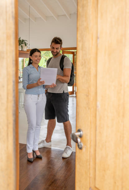istock Friendly hostess explaining the rules to a guest staying in her house 1134350143