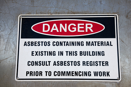 An Asbestos Warning Sign highlighting the dangers of Asbestos containing materials.