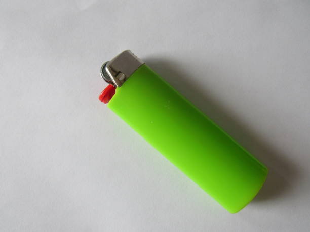 Green Bic Lighter Cigarette Lighter cigarette lighter stock pictures, royalty-free photos & images