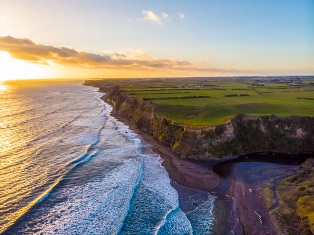istock Last light of the day over Ohawe Beach 1134357258