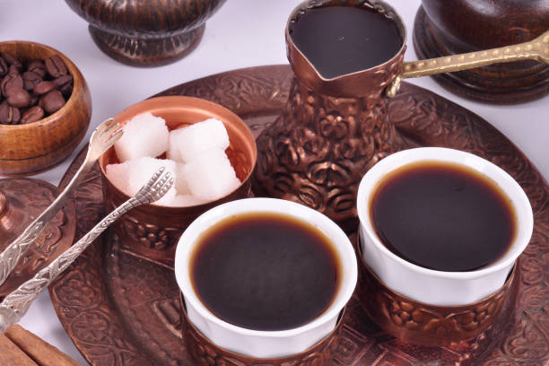 istock Coffee in copper coasters with accessories for coffee-drinking on a white background 1134358216