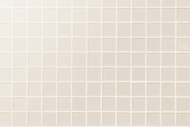 istock White or Cream ceramic wall and floor tiles abstract background. 1134358876