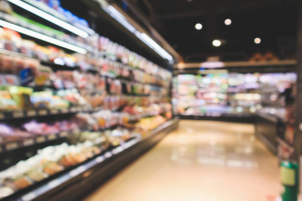istock Abstract supermarket aisle interior blurred defocused background with bokeh light 1134361436