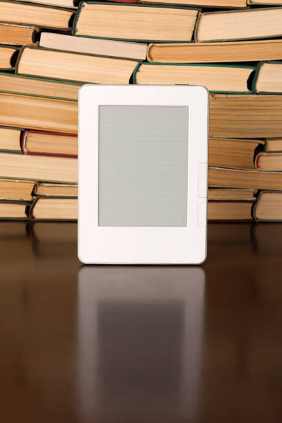 istock Electronic book on background of regular text books 1134363039