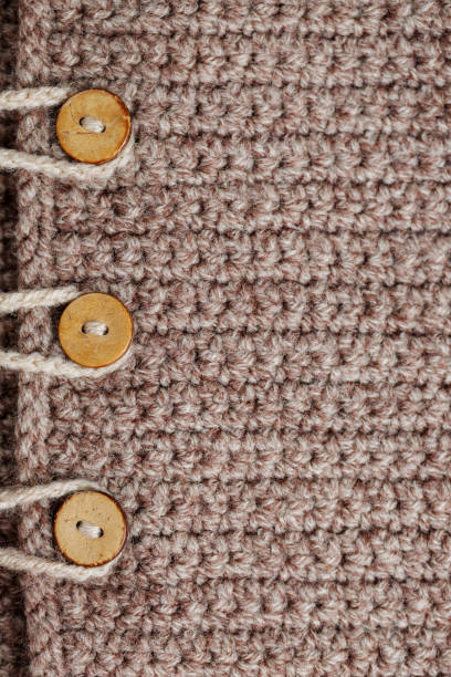 istock Buttons On Wool Texture. Wool With Wood Buttons 1134363251