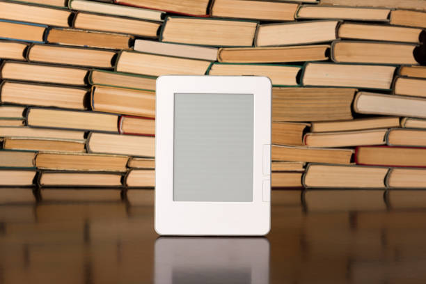 istock Electronic book on background of regular text books 1134364063