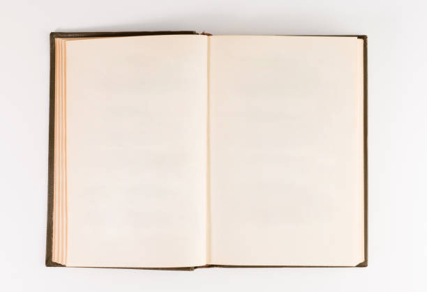 istock Blank open book isolated, top front view. brown hardcover with black 1134364096