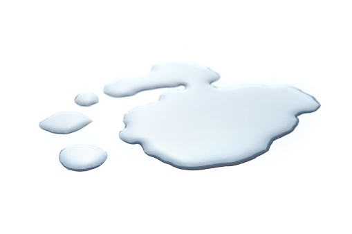 Water spilled on the floor with white background