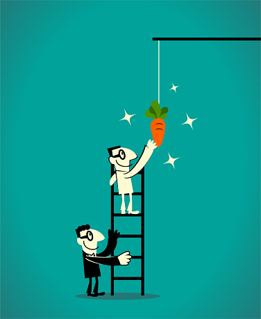 Two businessmen using a ladder to catch the dangling carrot at the end of a stick