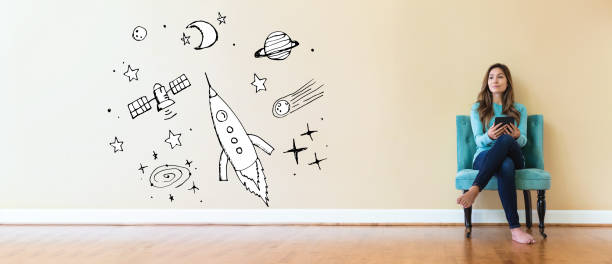 istock Dream of space and rocket with young woman 1134373820