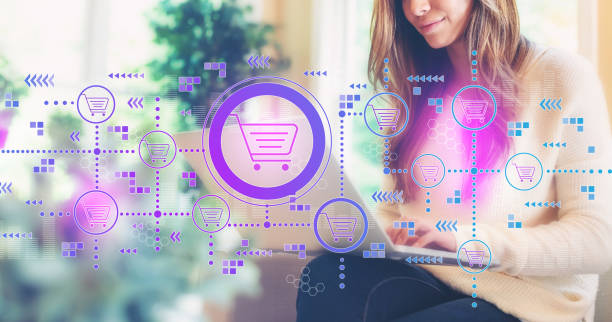 istock Online shopping theme with woman using a laptop 1134373824
