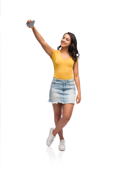 istock Young latin girl taking a selfie 1134378260