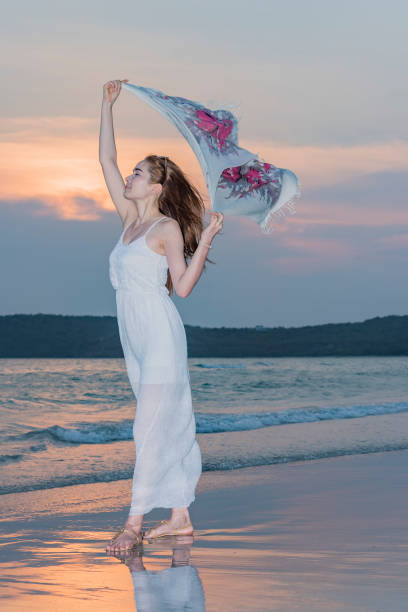 istock Beautiful women relax on the beach 1134379055