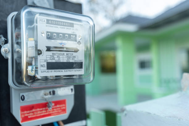 Electrical equipment.energy meter is a device that measures the amount of electric energy consumed by a residence, a business, or an electrically powered device stock photo