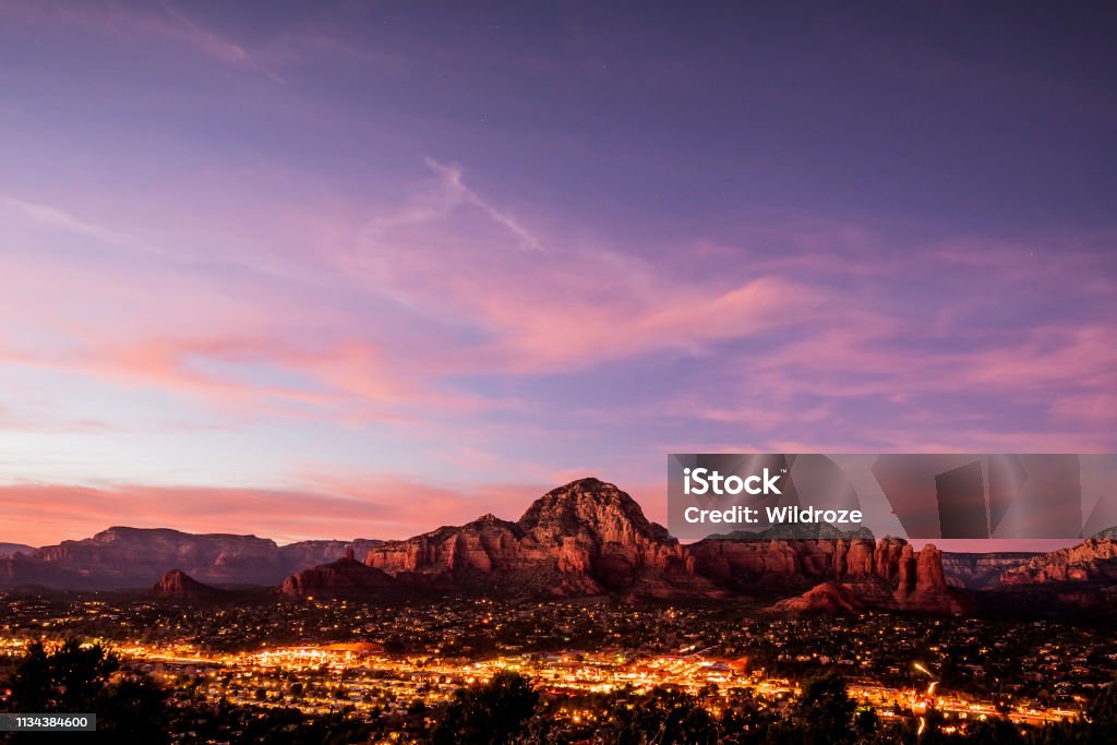 Sedona mountains viewed from Airport Mesa, in Arizona, USA Sedona mountains in Arizona, USA. View of Capitol Butte, also known as Thunder Mountain, from Airport Mesa at sunset. Arizona Stock Photo