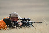 A hunter prepares for a shot during a pronghorn antelope hunt in Wyoming.