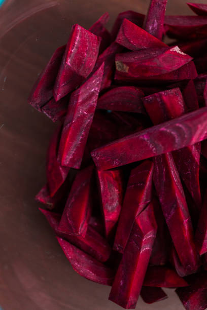 istock Sliced organic beets in a glass bowl to make borscht. 1134388730