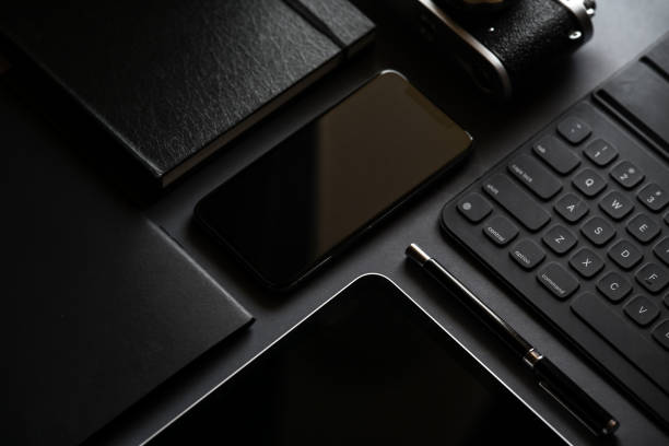 istock Office stationery on dark background. 1134390278