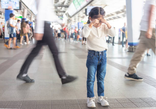 kid crying to lost parent on sky train station.