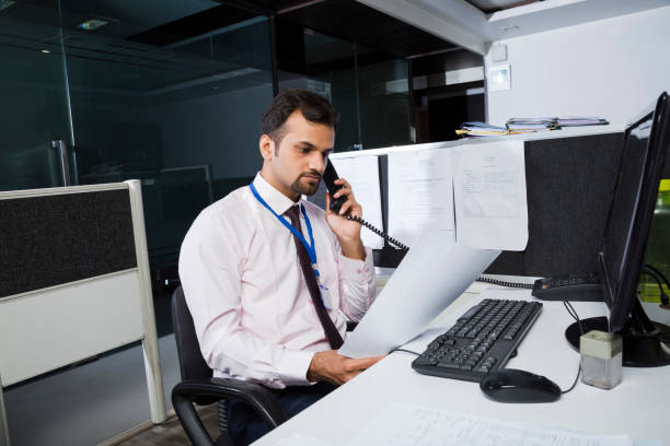 istock Working late in a small office in Barcelona - Stock image 1134396118