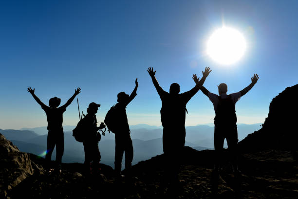 istock peak success of passionate climbers 1134397518
