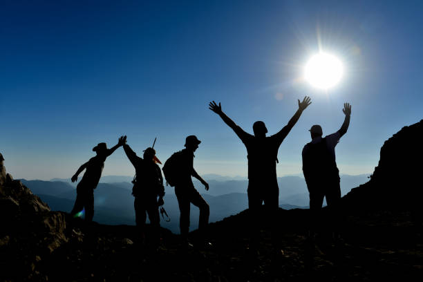 istock feelings of accomplishment together and summits 1134397553