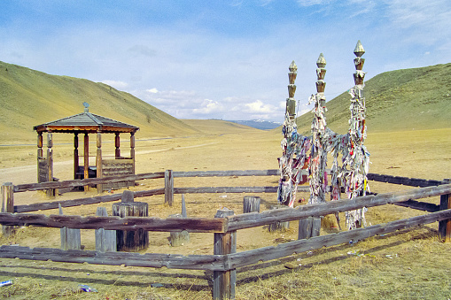 Colored ribbons on trees and pillars, superstition for good luck, Baikal traditions.