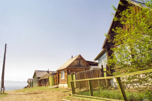 Old wooden buildings on the shores of Lake Baikal, Wooden house on the lake.