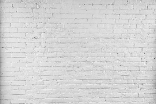 White painted small brick wall background