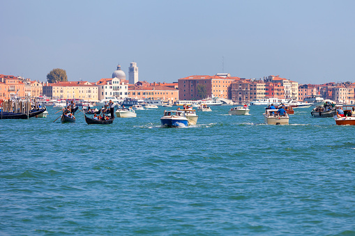 Venice, Italy - September 22, 2017: Venetian Lagoon, different types of boats, heavy traffic on St. Mark's Basin, visiting the city by tourists