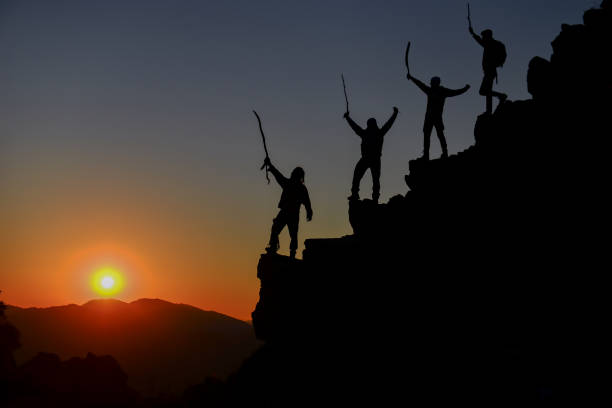 istock successful concept with team of compatible climbers 1134406050