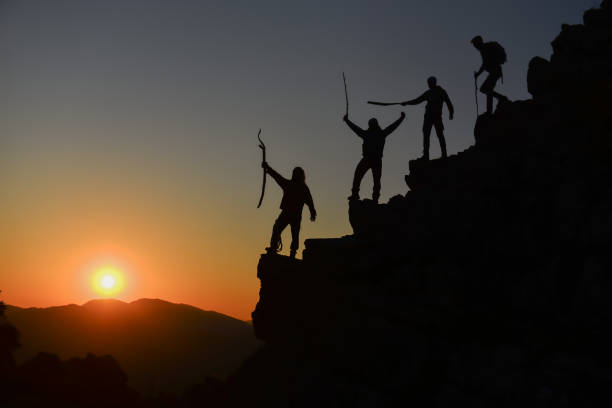 istock successful concept with team of compatible climbers 1134406226