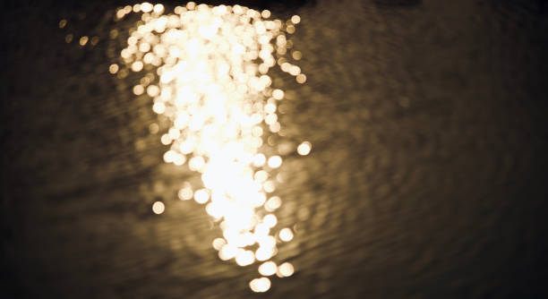 istock Sunlight reflection fallen on the water of a lake 1134407464