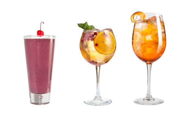 istock A variety of alcoholic drinks, beverages and cocktails on a white background. Three different drinks with fruits and berries. 1134409378