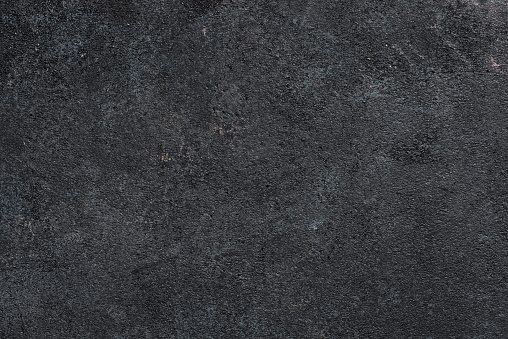 Textured dark rough background, surface of wall
