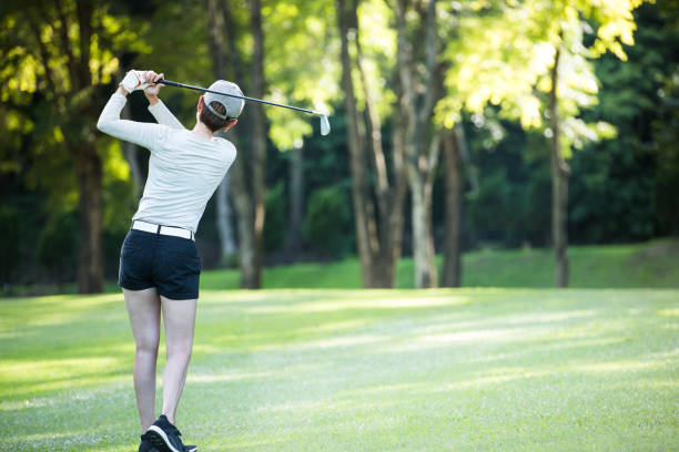 istock Asian woman playing golf on a beautiful natural golf course 1134417510