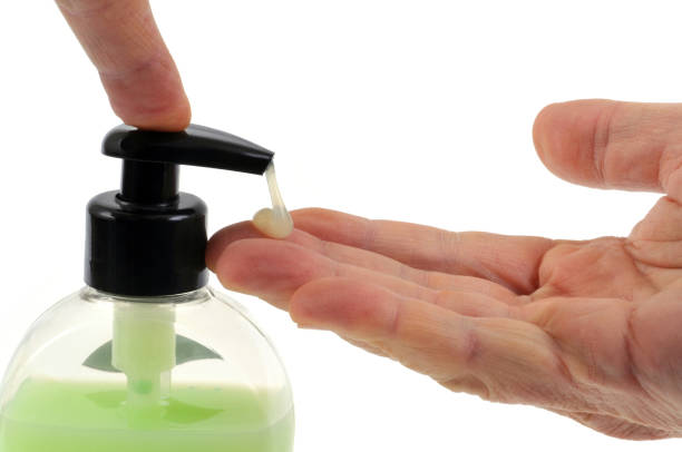 Hand wash SOAP press a soap dispenser in close-up savon stock pictures, royalty-free photos & images