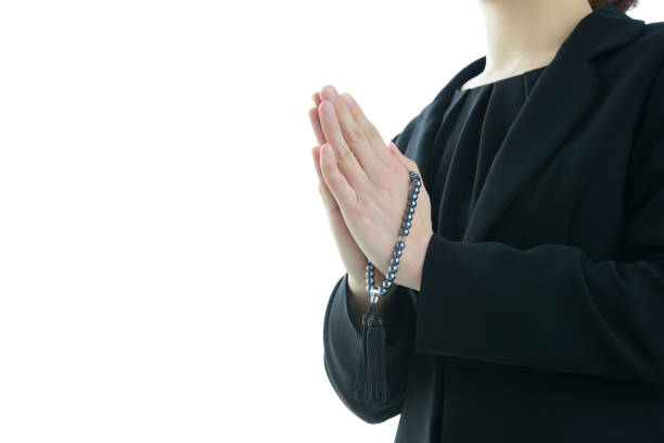 istock Japanese praying style in funeral 1134421570