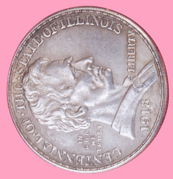 istock half dollar coin isolated on pink background 1134423881