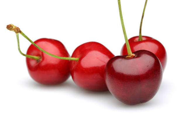 istock Ripe red cherries isolated on white 1134427357