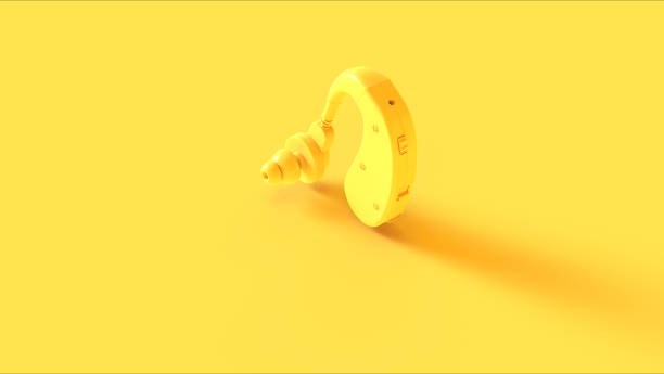 istock Yellow Behind the Ear Hearing Aid 1134427543