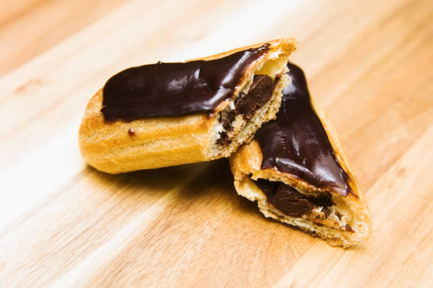 istock Eclair crispy creamy cake with dark chocolate 1134430584